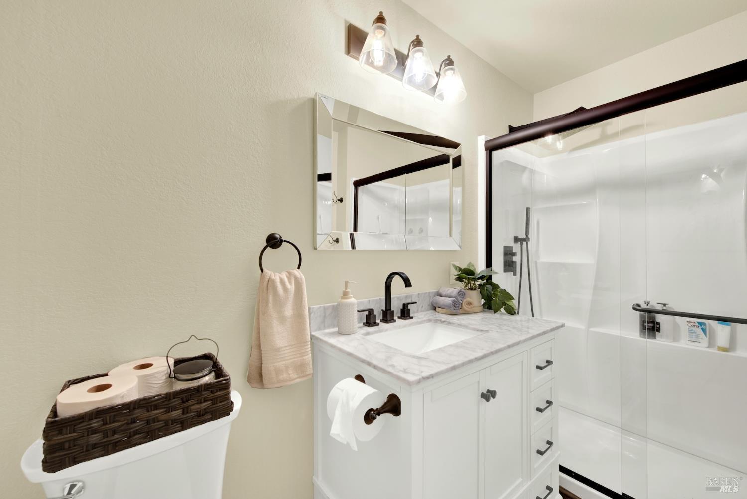 4118 Georgia Street Vallejo, CA 94591 - Photo 38 of 56 a bathroom with a sink and a mirror