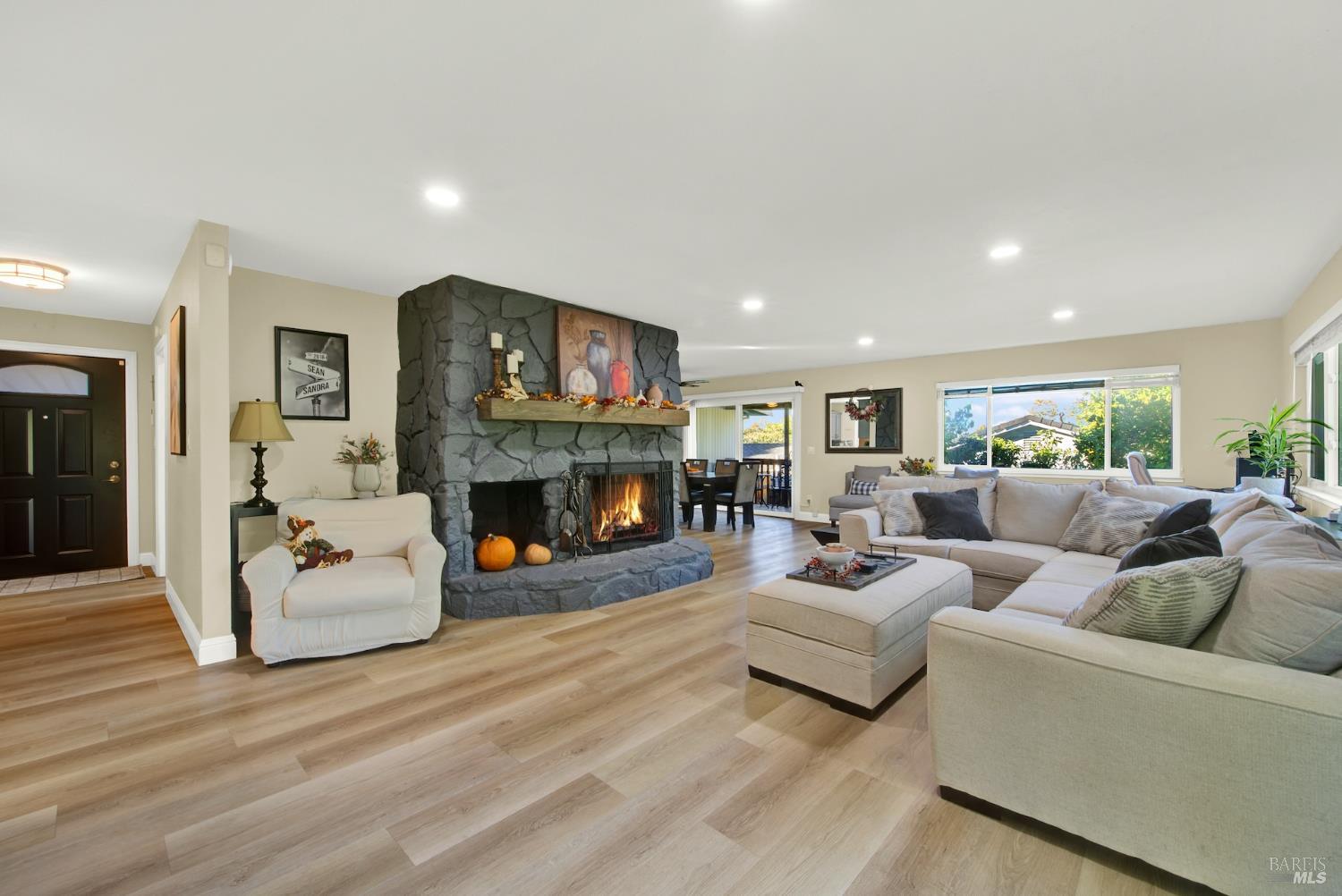 4118 Georgia Street Vallejo, CA 94591 - Photo 6 of 56 a living room with furniture and a flat screen tv