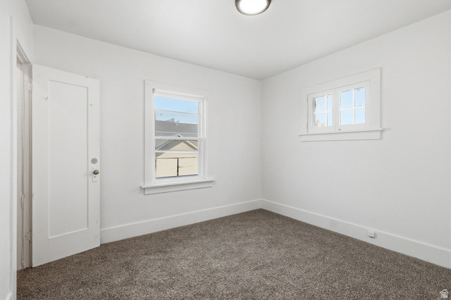 871 North 700 East Logan, UT 84321 - Photo 12 of 20 Carpeted empty room with baseboards