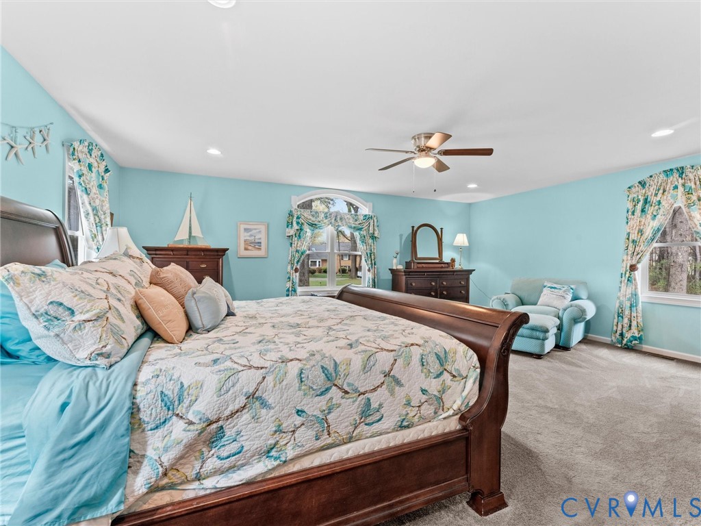 10488 Old Telegraph Road Ashland, VA 23005 - Photo 38 of 69 a bedroom with two beds and a chandelier