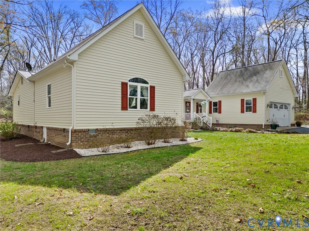10488 Old Telegraph Road Ashland, VA 23005 - Photo 4 of 69 a front view of house with yard and green space