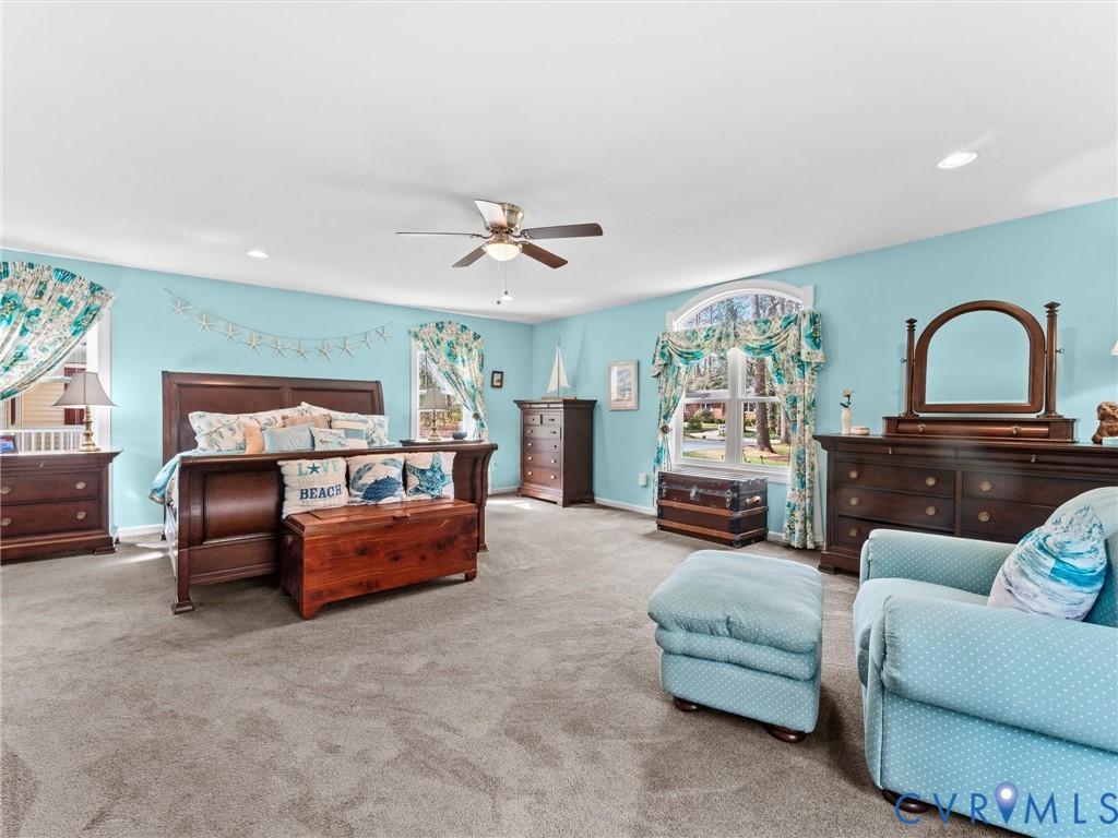 10488 Old Telegraph Road Ashland, VA 23005 - Photo 41 of 69 a living room with furniture and a ceiling fan