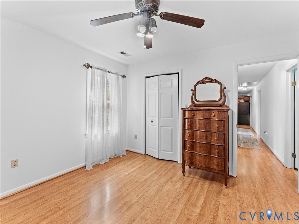 10488 Old Telegraph Road Ashland, VA 23005 - Photo 58 of 69 a view of empty room with wooden floor and fan