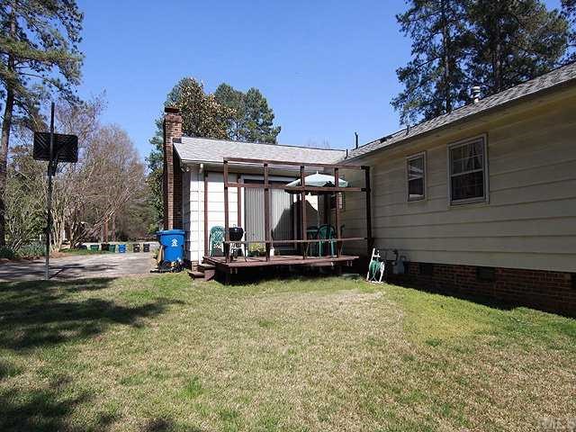 1343 Sedwick Road Durham, NC 27713 - Photo 12 of 14 Deck for grilling. Basketball goal at end of driveway.
