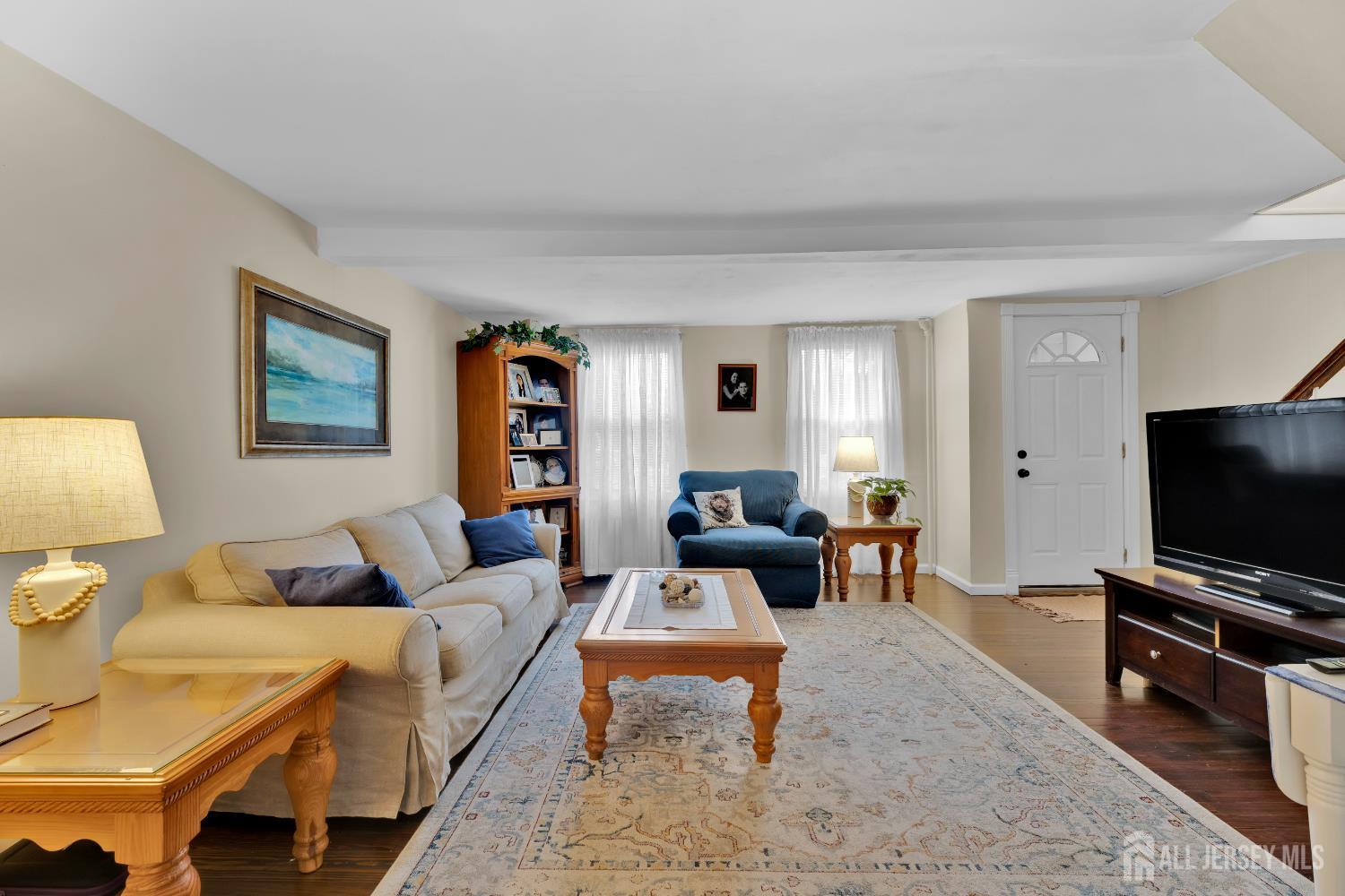 18 Pine Street Keyport, NJ 07735 - Photo 18 of 31 a living room with furniture and a flat screen tv
