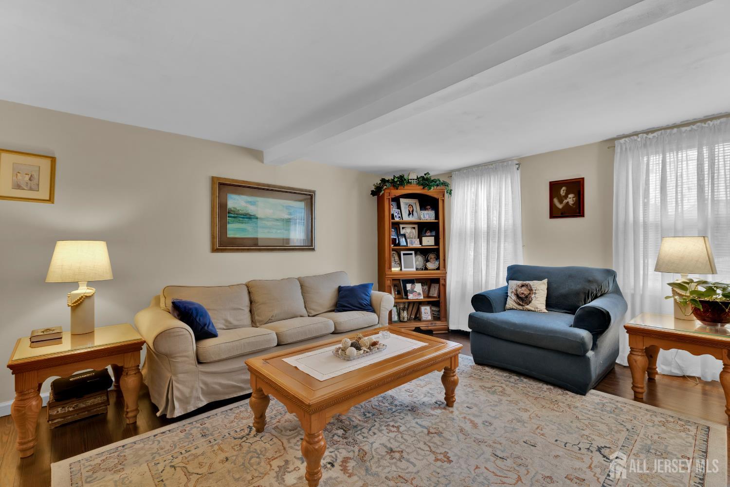 18 Pine Street Keyport, NJ 07735 - Photo 19 of 31 a living room with furniture a lamp and a window