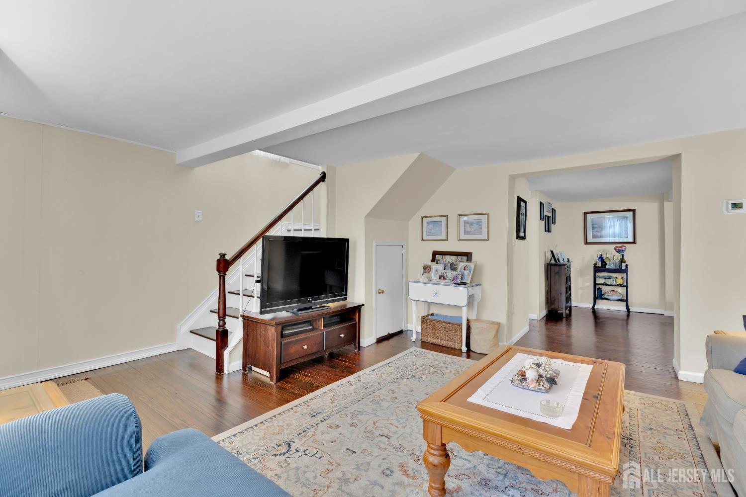 18 Pine Street Keyport, NJ 07735 - Photo 20 of 31 a living room with furniture and a flat screen tv
