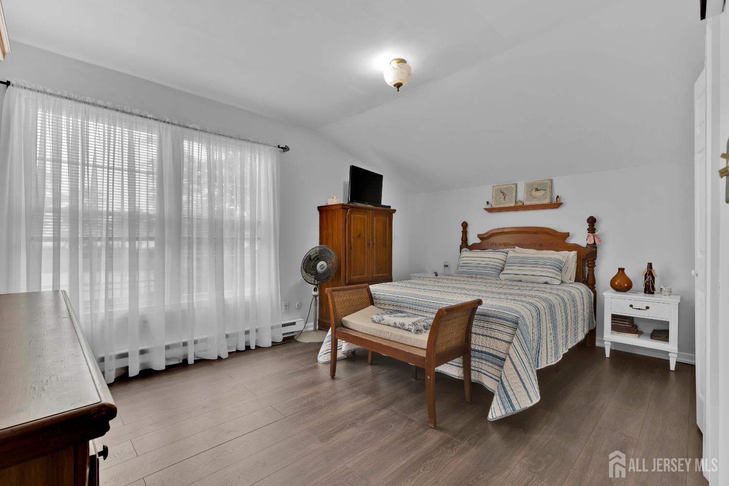 18 Pine Street Keyport, NJ 07735 - Photo 24 of 31 a bedroom with a bed and a window