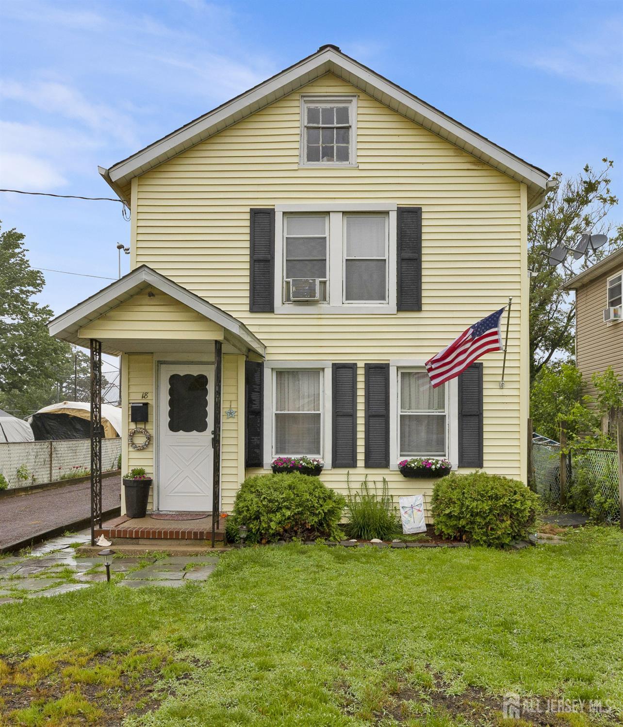 18 Pine Street Keyport, NJ 07735 - Photo 5 of 31 a front view of a house with a yard