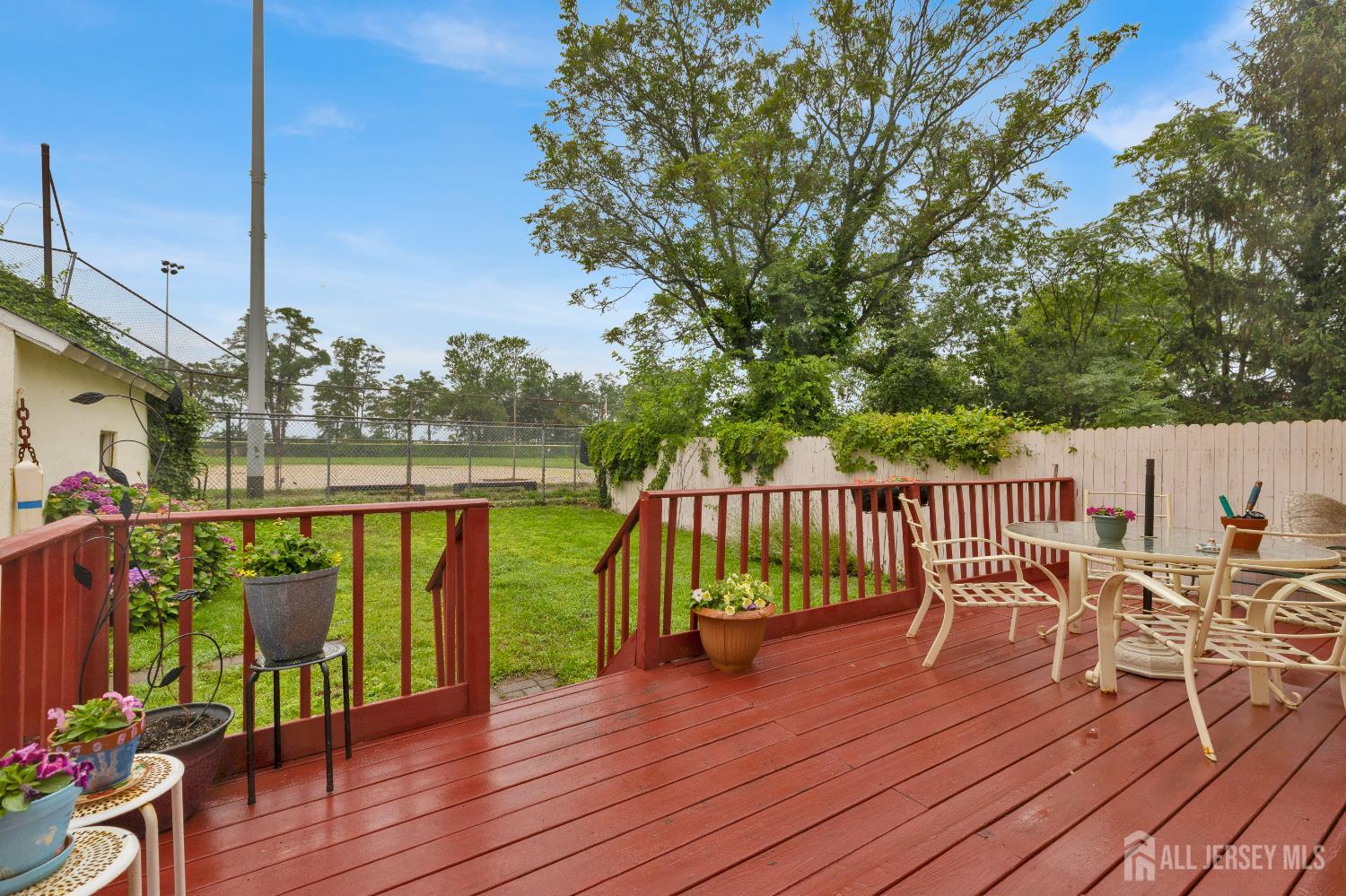 18 Pine Street Keyport, NJ 07735 - Photo 9 of 31 a view of balcony with furniture and wooden floor