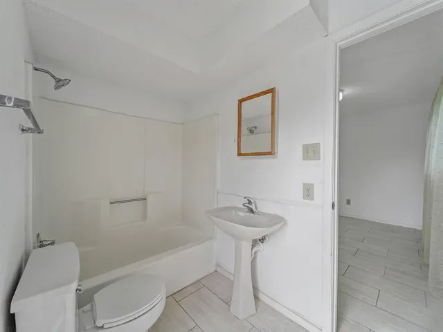 a view of a back yard of the house