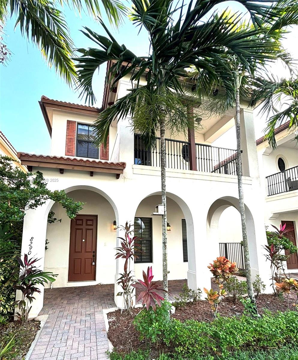 8290 Northwest 39th Court, Unit 8290 Cooper City, FL 33024 - Photo 1 of 19 a front view of house along with deck and outdoor seating