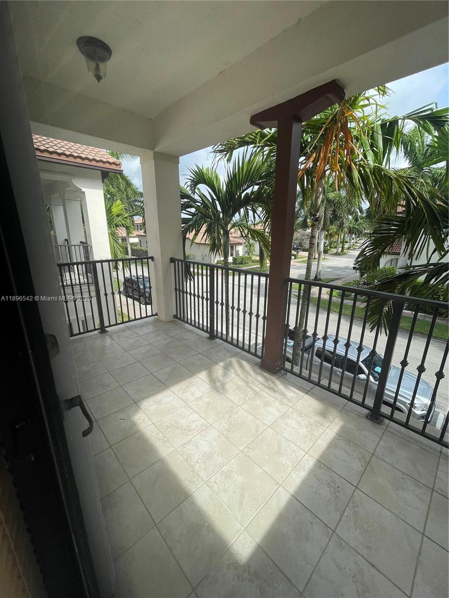 8290 Northwest 39th Court, Unit 8290 Cooper City, FL 33024 - Photo 16 of 19 a view of a porch