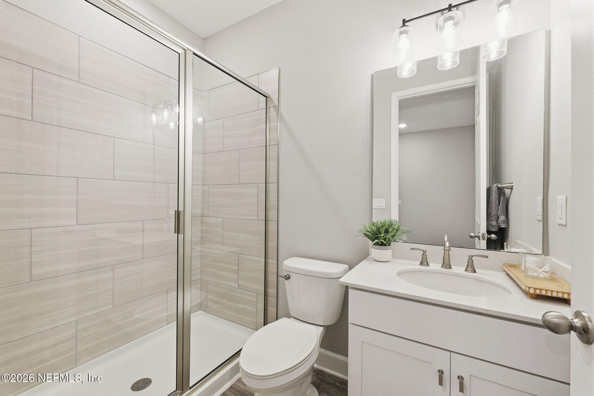 301 Field Flower Way St. Augustine, FL 32092 - Photo 9 of 58 a bathroom with a sink toilet and shower