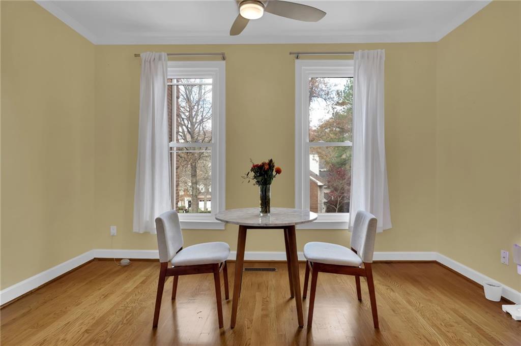 7155 Roswell Road, Unit 14 Atlanta, GA 30328 - Photo 11 of 35 a view of a room with furniture window and wooden floor