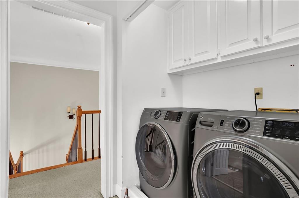 7155 Roswell Road, Unit 14 Atlanta, GA 30328 - Photo 19 of 35 a utility room with dryer and washer