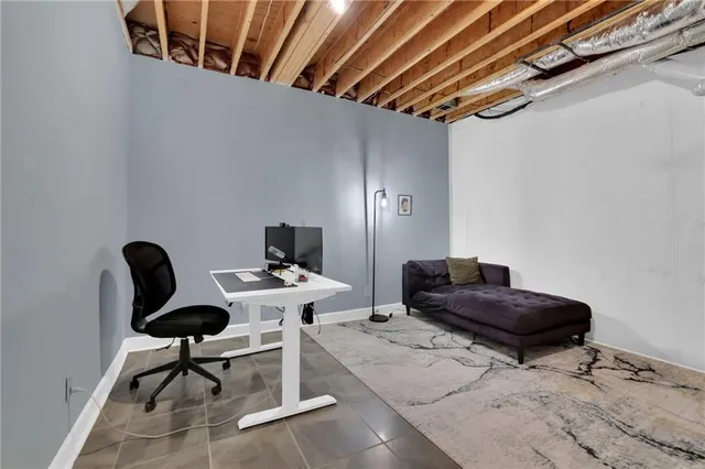 a view of garden with trees in the background