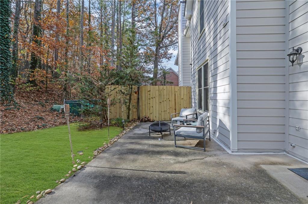 7155 Roswell Road, Unit 14 Atlanta, GA 30328 - Photo 31 of 35 a view of garden with patio