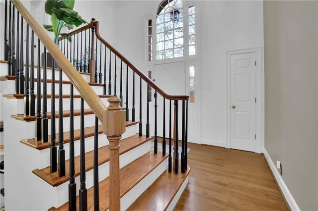 a view of entryway with wooden floor
