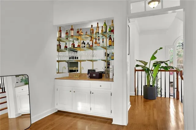 a view of a living room and entryway