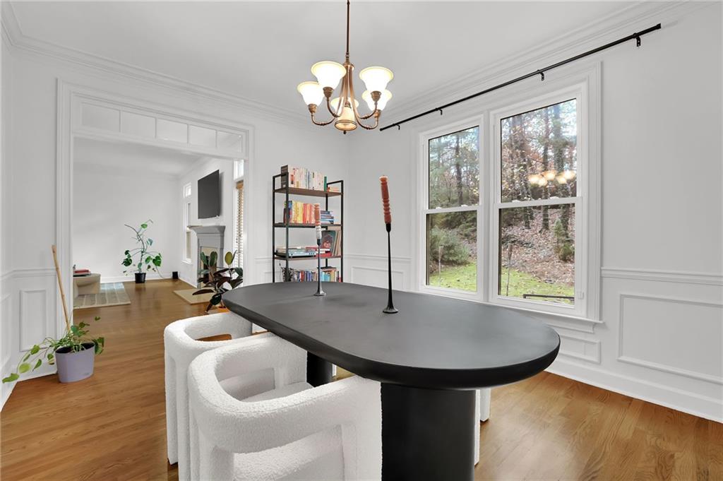 7155 Roswell Road, Unit 14 Atlanta, GA 30328 - Photo 10 of 35 a dining room with furniture and window