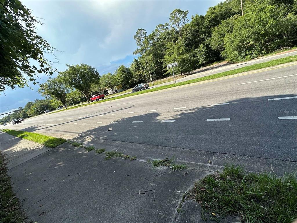 2339 Southeast Hawthorne Road Gainesville, FL 32641 - Photo 12 of 19 a view of a road with a yard