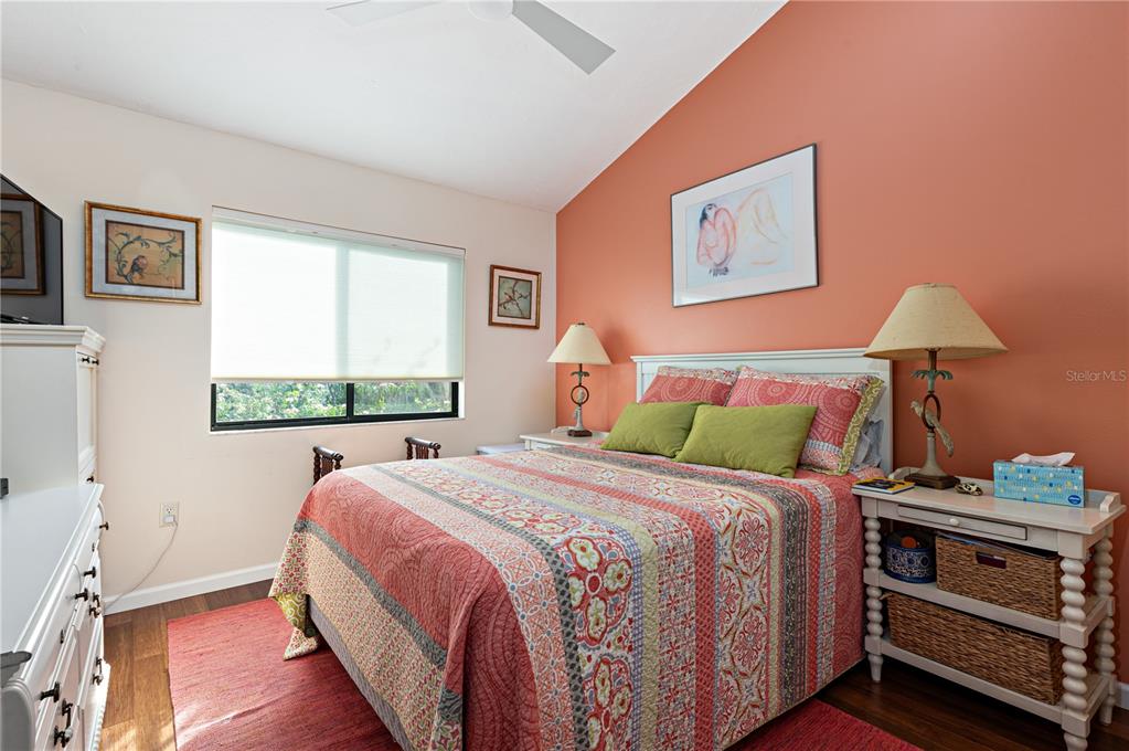 1512 Pelican Cove Road, Unit 239 Sarasota, FL 34231 - Photo 14 of 29 a bedroom with a bed and a window