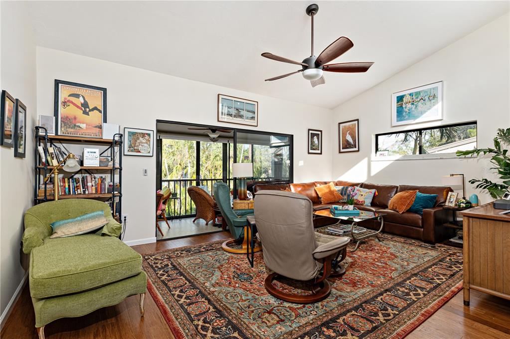 1512 Pelican Cove Road, Unit 239 Sarasota, FL 34231 - Photo 3 of 29 a living room with furniture