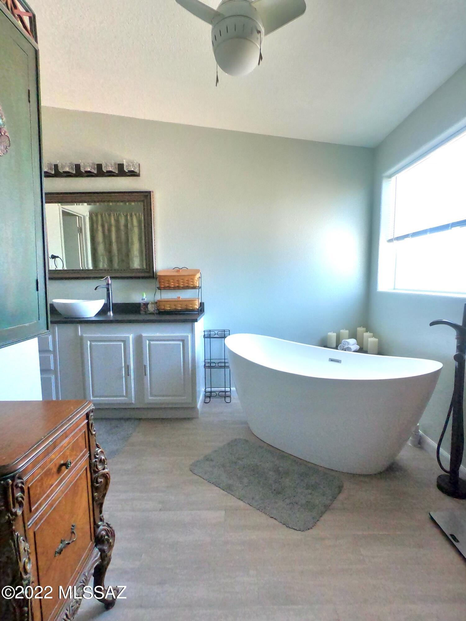 13643 East Bright Sky Loop Vail, AZ 85641 - Photo 14 of 22 a view of a bathtub in a room