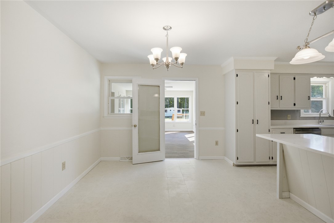 207 Greenmeadow Circle Anderson, SC 29626 - Photo 12 of 38 This bright kitchen and dining area offers functional design and seamless flow to outdoor spaces.