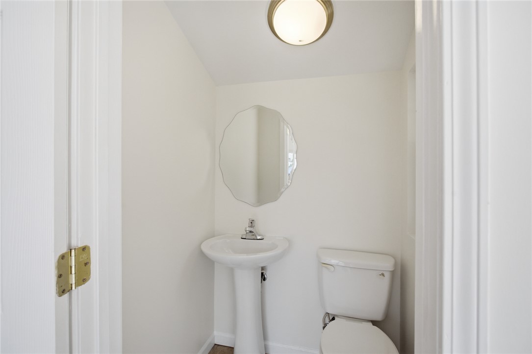 207 Greenmeadow Circle Anderson, SC 29626 - Photo 15 of 38 This bright bathroom features a pedestal sink and toilet, perfect for daily routines.
