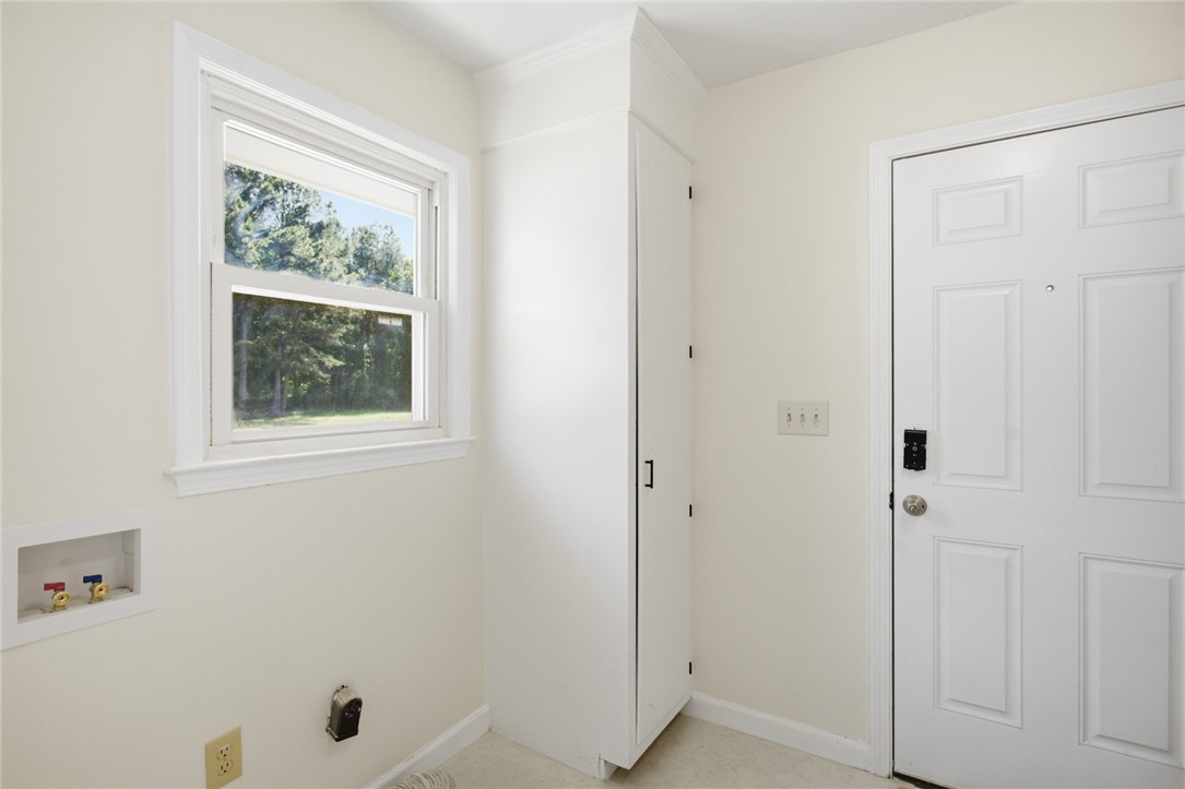 207 Greenmeadow Circle Anderson, SC 29626 - Photo 17 of 38 This functional laundry area features essential hookups and convenient storage.