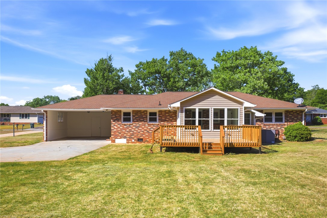 207 Greenmeadow Circle Anderson, SC 29626 - Photo 30 of 38 This charming home offers a spacious backyard and a delightful deck for outdoor enjoyment.