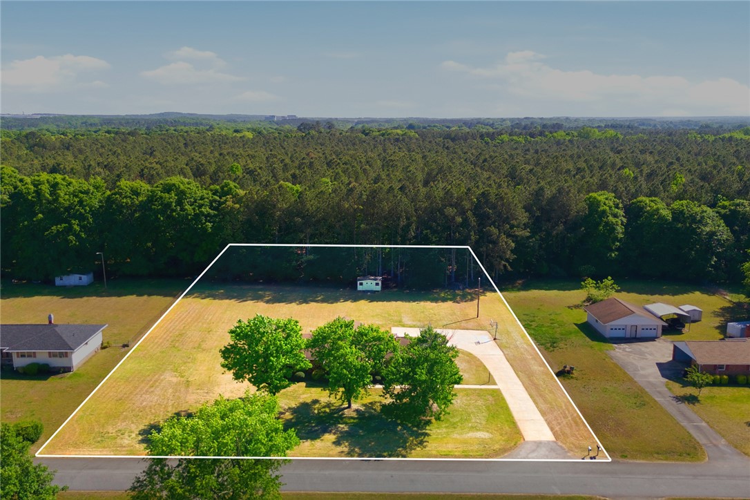 207 Greenmeadow Circle Anderson, SC 29626 - Photo 34 of 38 Expansive acreage offering a generous canvas for your vision, bordered by lush natural surroundings.