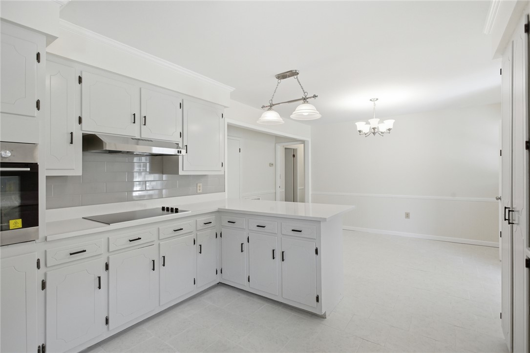 207 Greenmeadow Circle Anderson, SC 29626 - Photo 10 of 38 This spacious kitchen offers ample cabinetry and an open layout, ideal for culinary creations and entertaining.