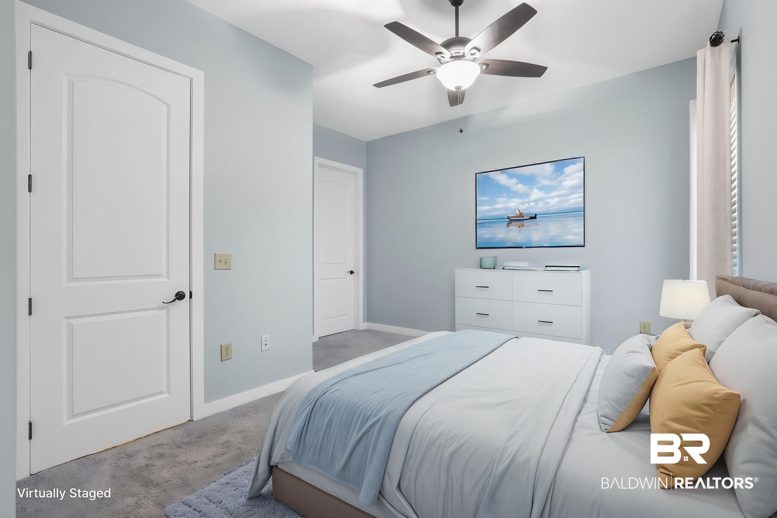 1430 Regency Road, Unit B302 Gulf Shores, AL 36542 - Photo 10 of 24 Bedroom with light colored carpet, baseboards, and ceiling fan