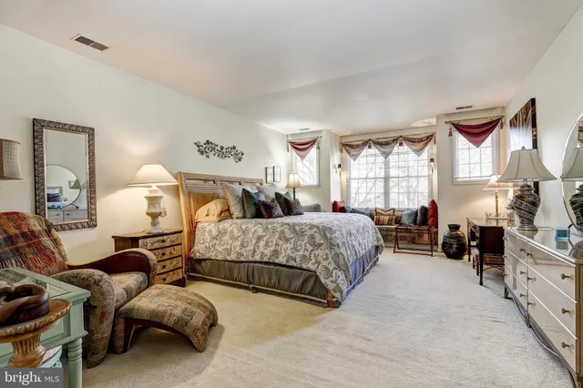 a view of a chairs and table in the patio