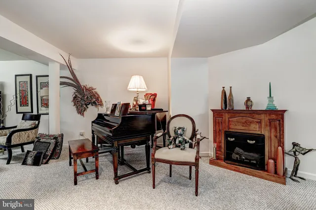 a view of a yard with wooden fence