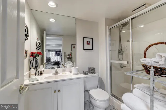 a black and white photo of a refrigerator