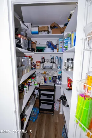 a view of a kitchen with a sink