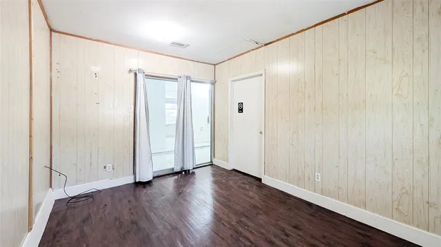 a view of a house with a street