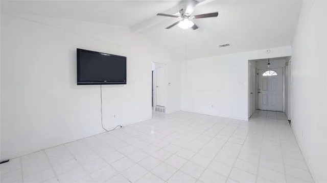 a view of a livingroom with a flat screen tv