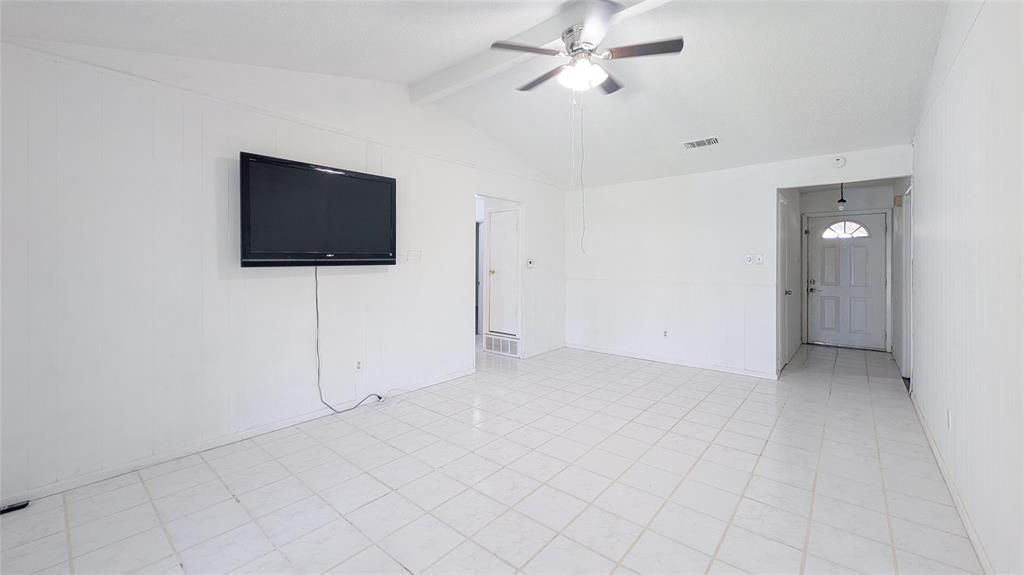 1107 Waverly Drive Arlington, TX 76015 - Photo 8 of 20 a view of a livingroom with a flat screen tv