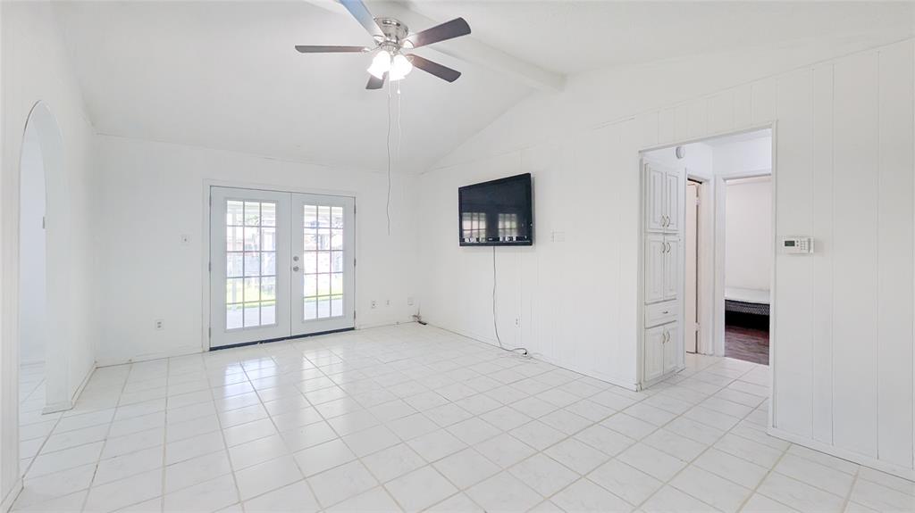 1107 Waverly Drive Arlington, TX 76015 - Photo 9 of 20 a view of an empty room with a window