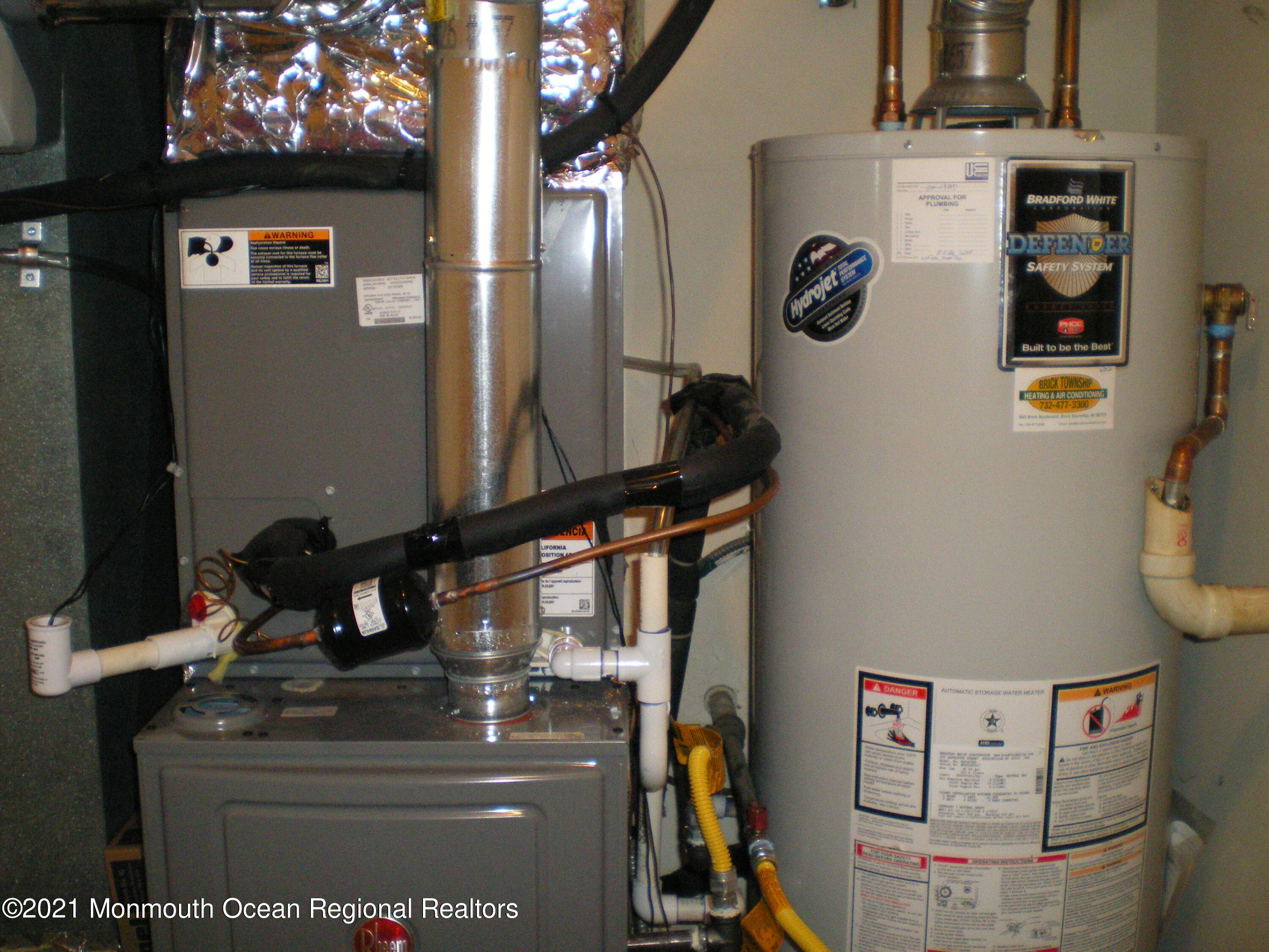 40 Rainier Drive Brick, NJ 08724 - Photo 21 of 25 a bathroom with a sink and a mirror