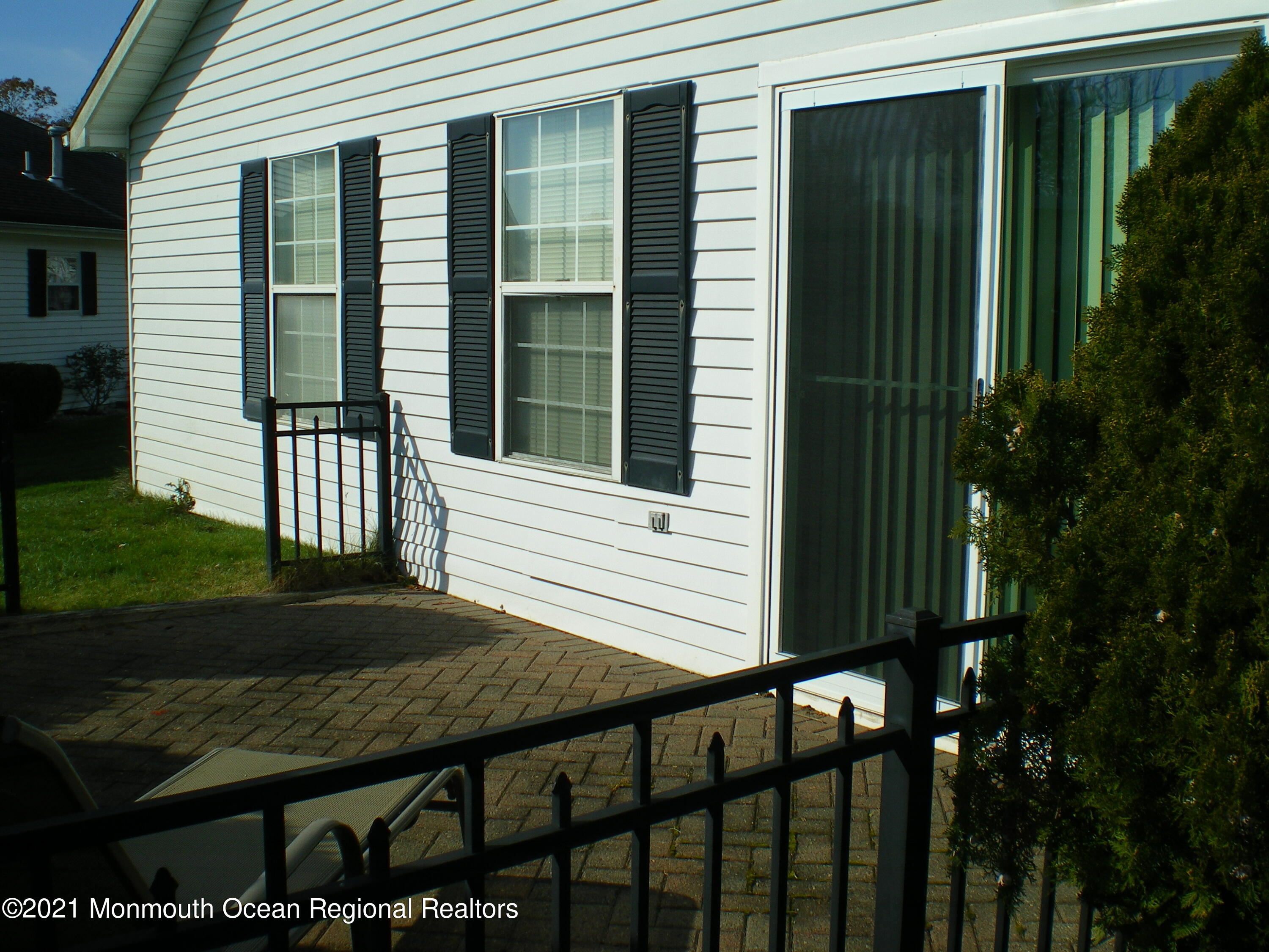 40 Rainier Drive Brick, NJ 08724 - Photo 24 of 25 a view of a house with backyard and porch