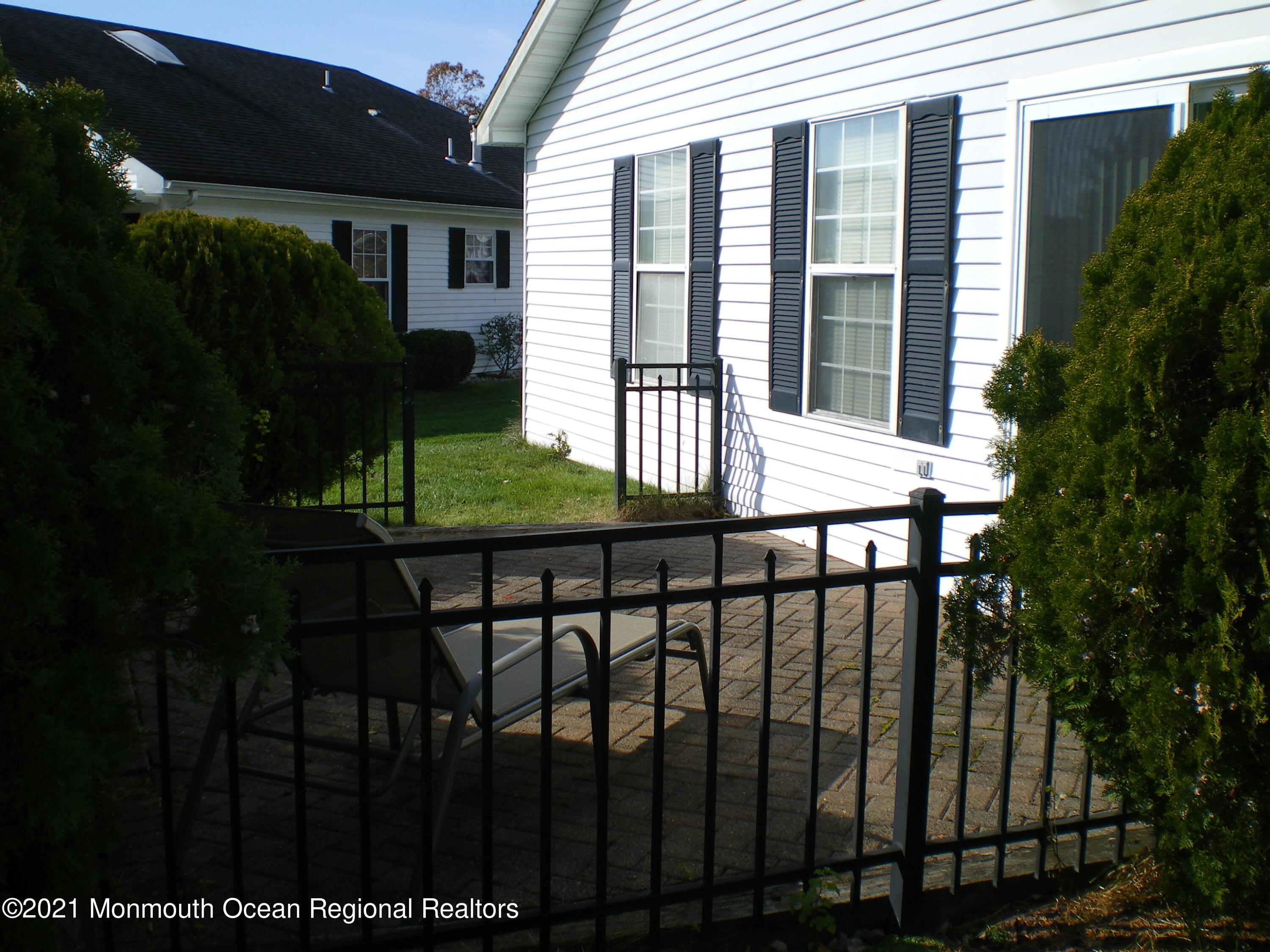 40 Rainier Drive Brick, NJ 08724 - Photo 25 of 25 a view of a house with backyard and porch