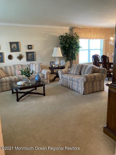 40 Rainier Drive Brick, NJ 08724 - Photo 6 of 25 a living room with furniture gym equipment and a large window