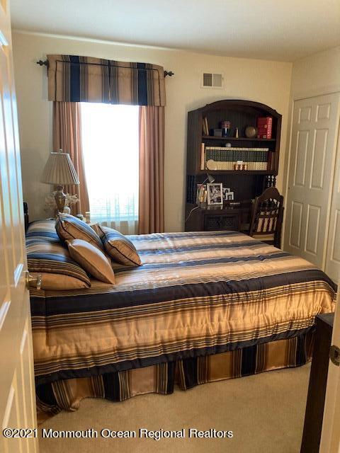 40 Rainier Drive Brick, NJ 08724 - Photo 9 of 25 a view of bedroom with furniture