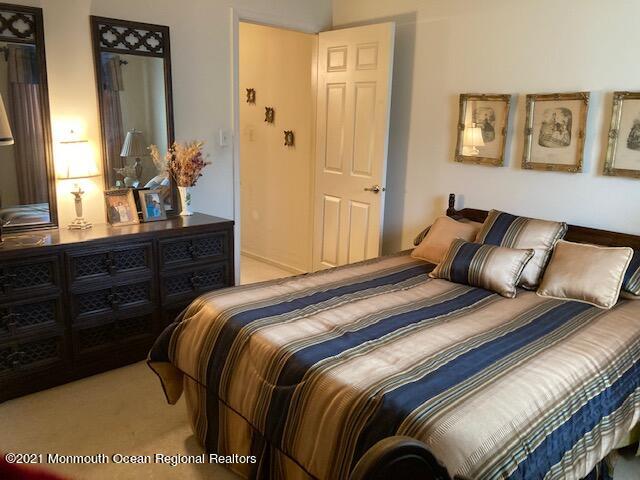 40 Rainier Drive Brick, NJ 08724 - Photo 10 of 25 a bedroom with a bed and a dresser